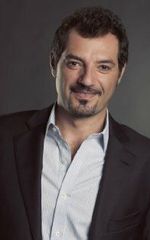 Адель Карам