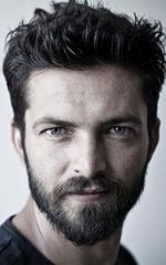 Илькер Кызмаз